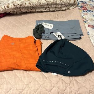 4 pcs Lululemon bundle orange pit to pit 20”. Blue short sleeve 19” pit to pit.